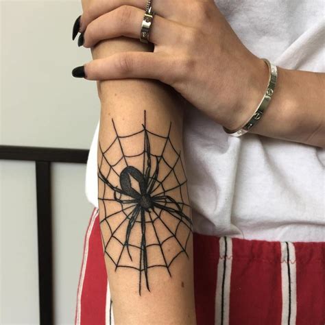 spiderweb tattoo